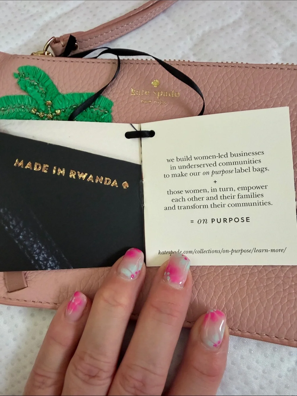 kate spade pink leather wristlet with green palm applique